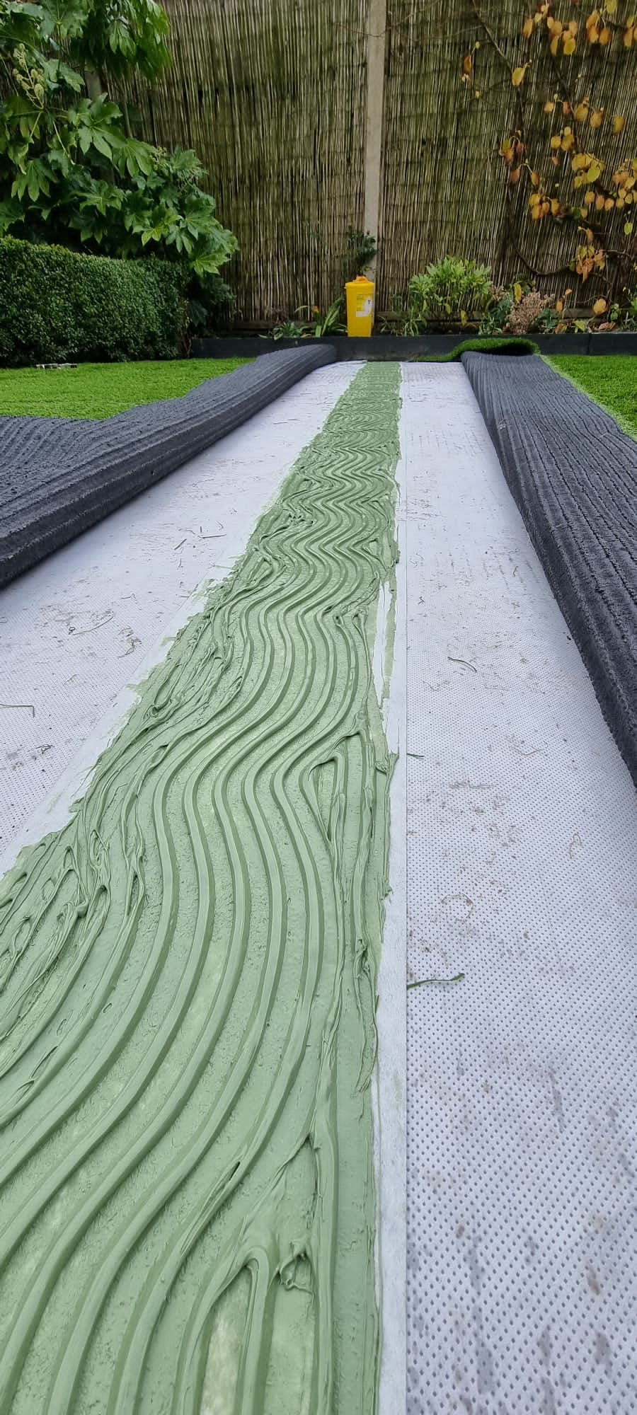 Grass tape with glue spread on